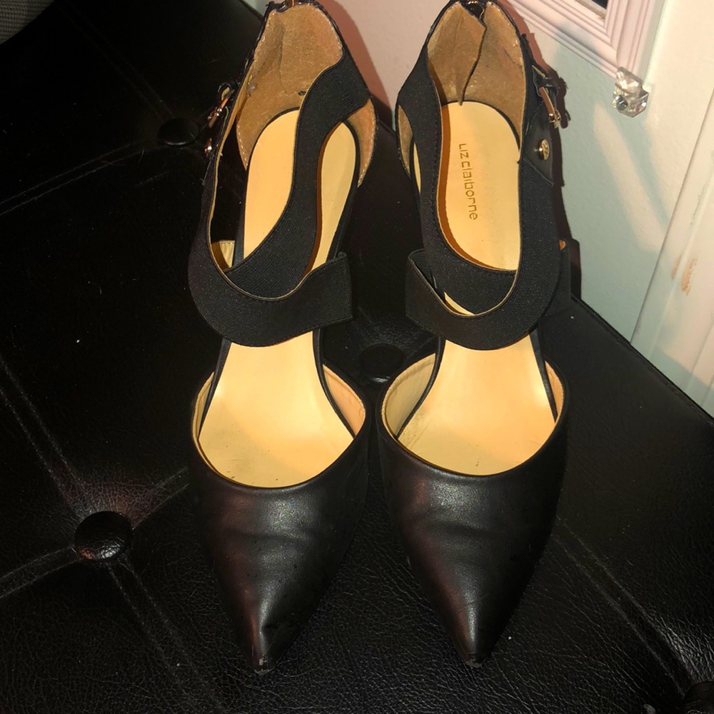 Black criss cross leather pumps